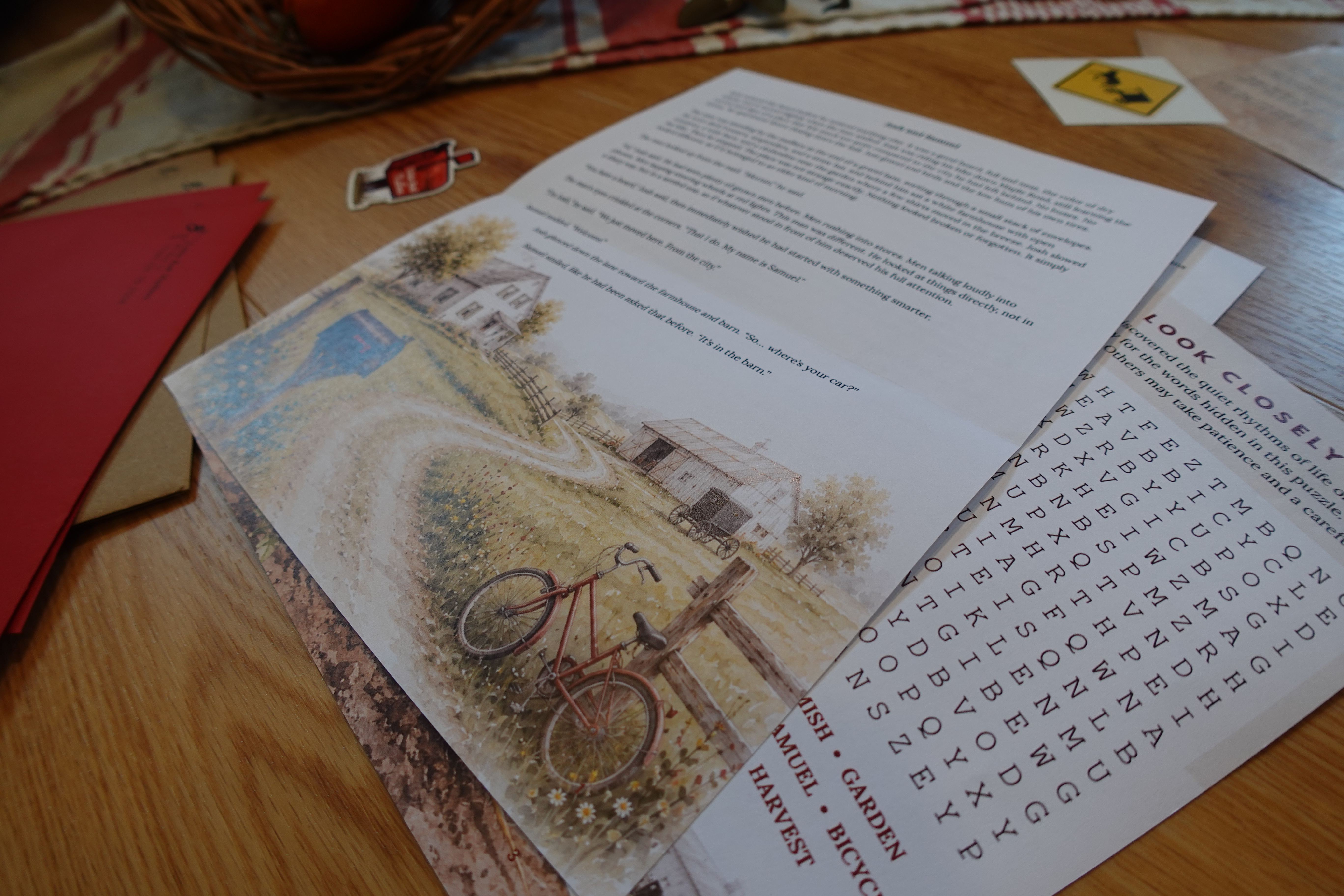Original Little Red Mailbox story pages and envelopes on a farmhouse table